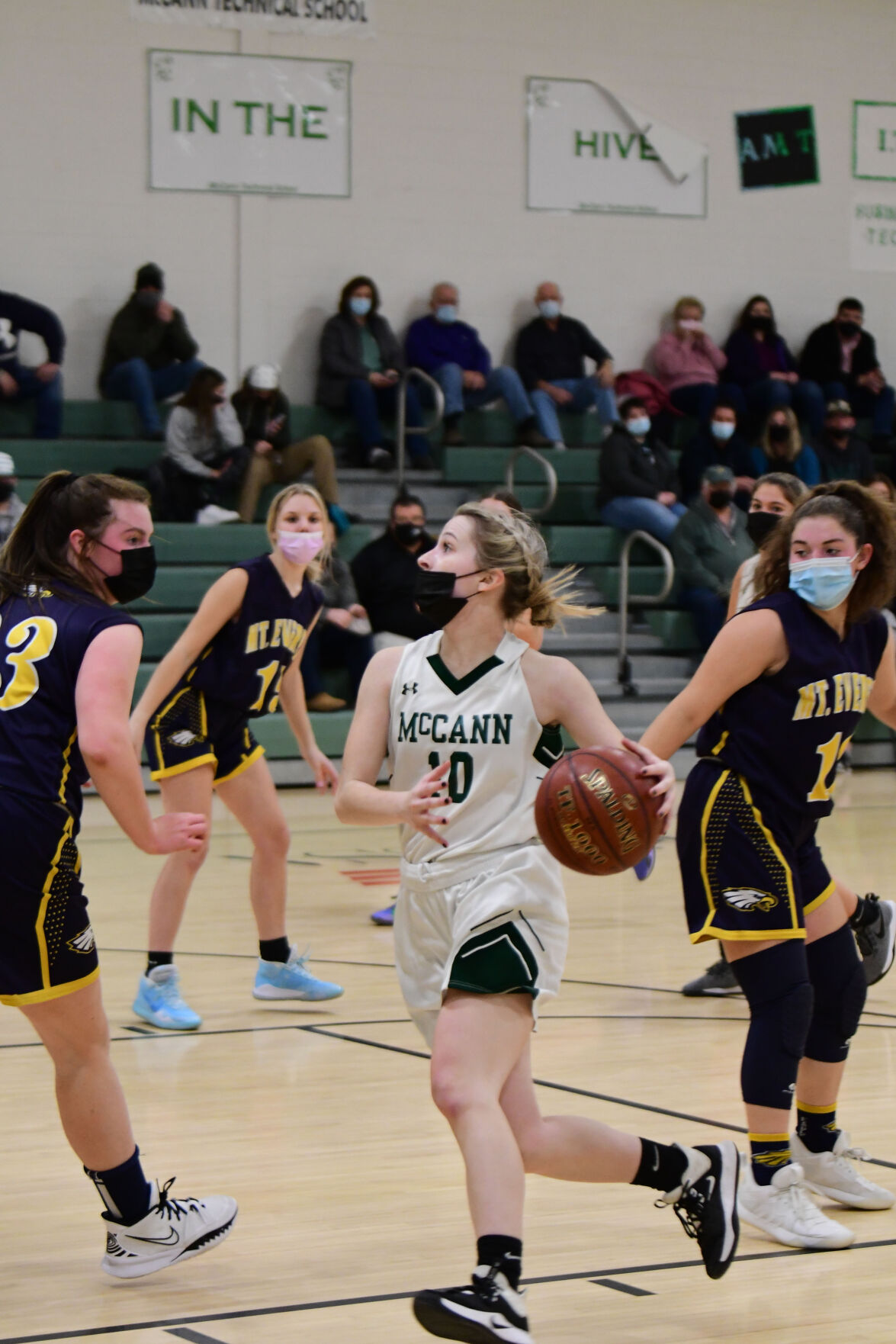 LaCasse dribbles the ball down the court